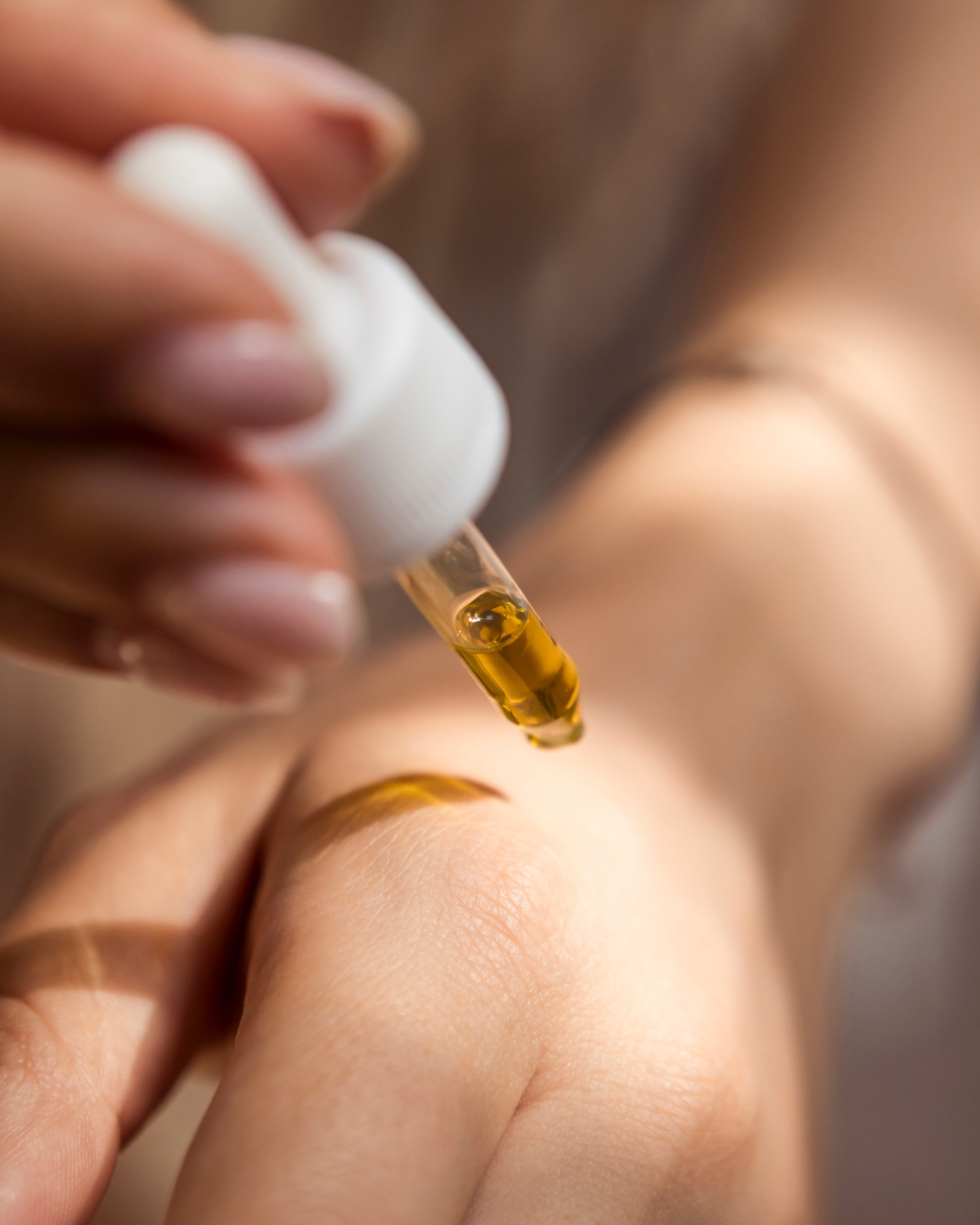 image of applying oil to skin