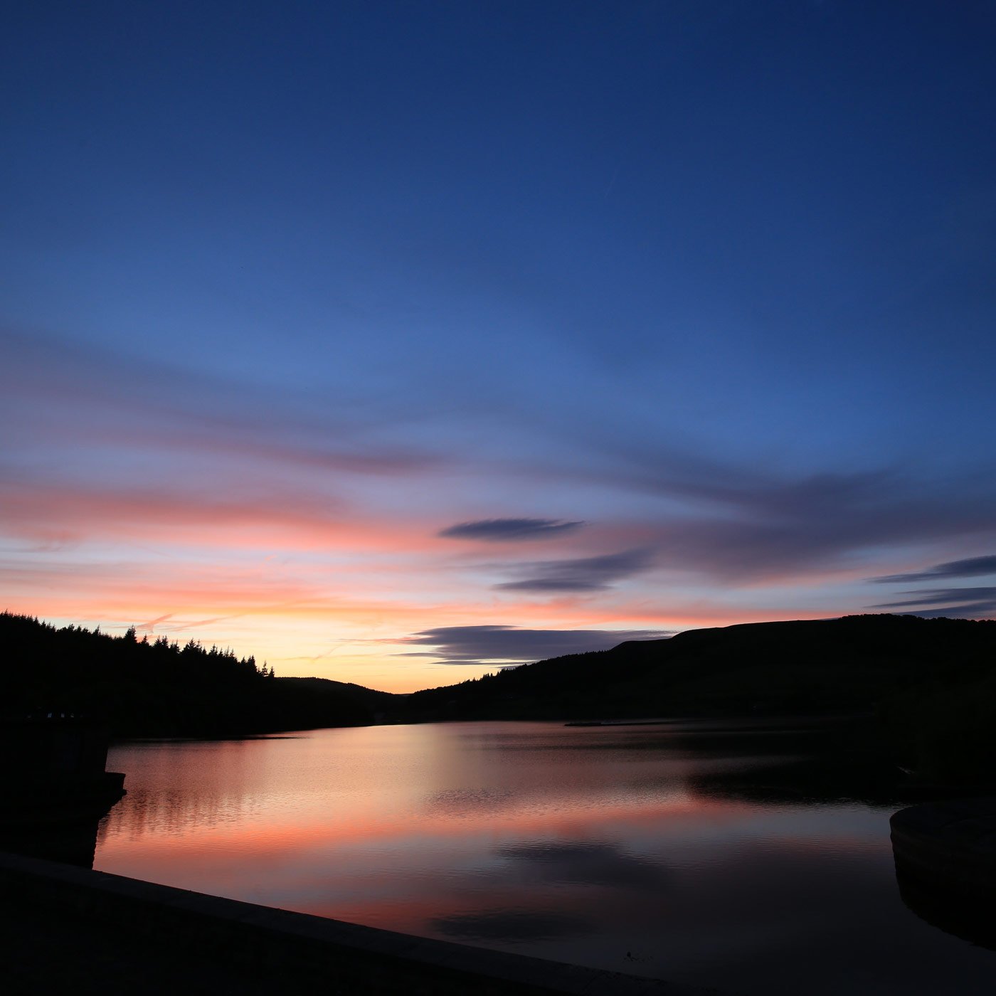 image of sunset with orange and purple clouds